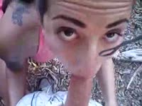 Outdoor POV blowjob movie features brunette teen sucking dick while on her knees outside